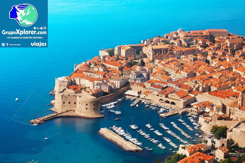 Old fort of Dubrovnik from the bird's view with blue sea and boats